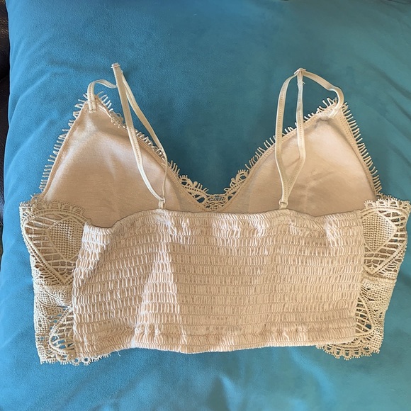 A nude colored crop top w/adjustable straps & removable pads.This is a size sm - Picture 2 of 4